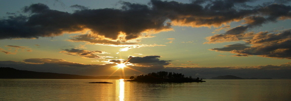 The sun sets on the San Juan Islands. Photo by Alex Shapiro.